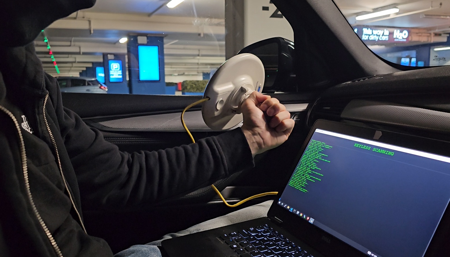 Relay attack illustration showing how thieves intercept keyless car signal
