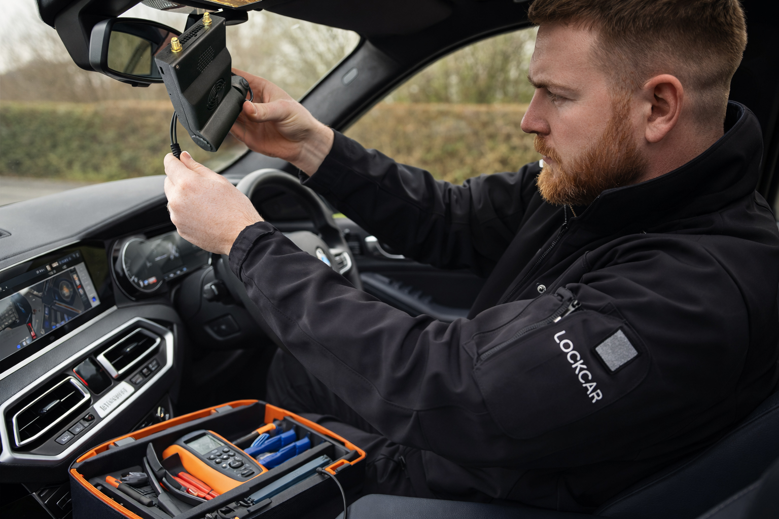 LockCar engineer installing Duo RH Plus on Range Rover in West Midlands