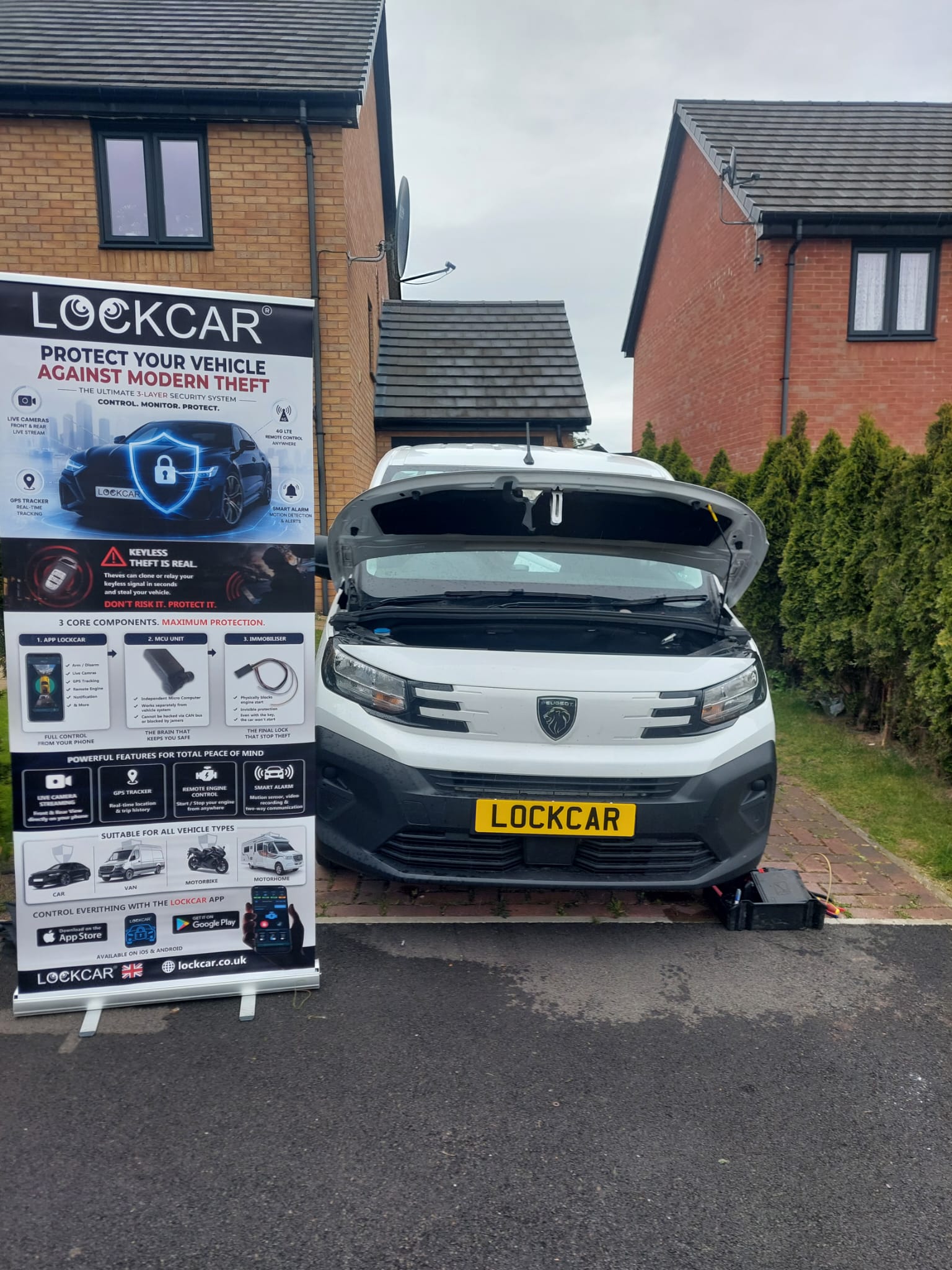 LockCar engineer fitting a vehicle immobiliser at the customer's home
