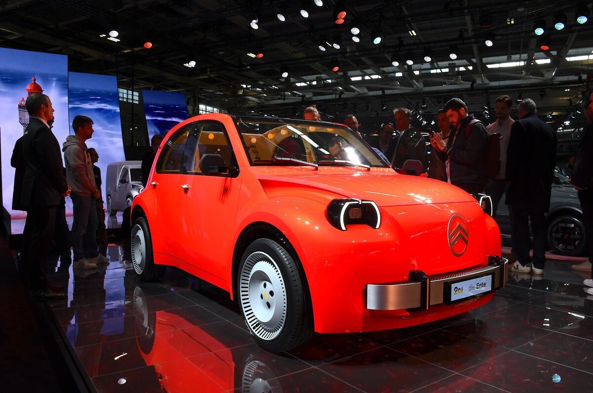 Orange-red Citroën 2CV electric concept on the stand at the Paris Motor Show 2026